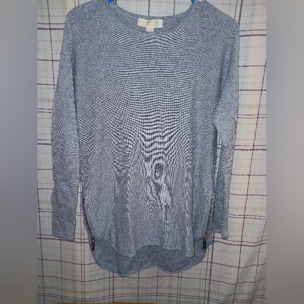 Michael Kors.sweater zips at the bottom size small